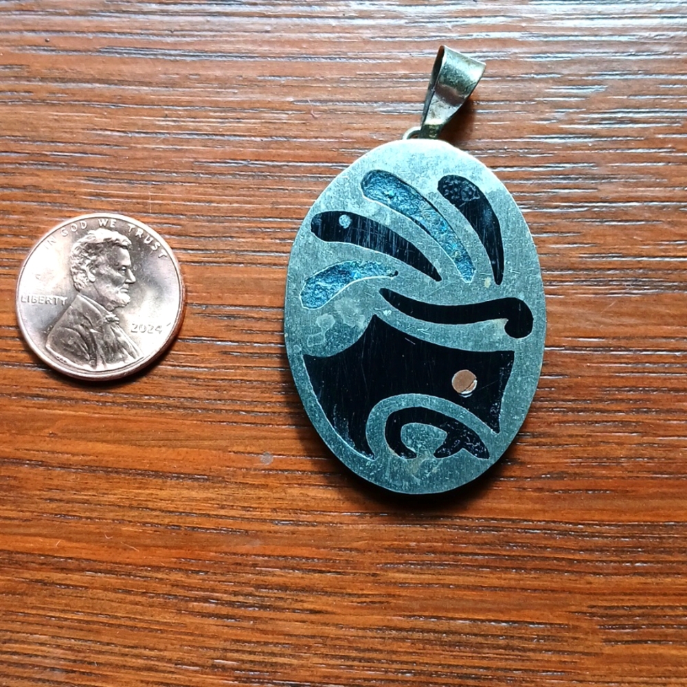 VINTAGE Mexican Silver and crushed stone mosaic Pendant w/ Aztec Warrior Face.